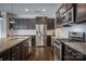 Modern kitchen with stainless steel appliances and granite countertops at 3836 Lake Breeze Dr, Sherrills Ford, NC 28673