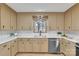 Bright kitchen with modern appliances, stylish backsplash, and ample counter space at 407 Thomas St, Marshville, NC 28103