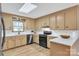 Charming kitchen featuring stainless steel appliances, white countertops, and subway tile backsplash at 407 Thomas St, Marshville, NC 28103