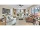 Bright living room with hardwood floors, modern furniture, an open floor plan, and a neutral color palette at 407 Thomas St, Marshville, NC 28103