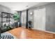 Entryway with gray walls, wood floors, and stylish decor at 4210 Saguaro Ct, Charlotte, NC 28269