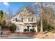 Two-story house with beige siding, green door, and attached garage at 4210 Saguaro Ct, Charlotte, NC 28269