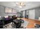 Living room with gray walls, wood floors, and stylish decor at 4210 Saguaro Ct, Charlotte, NC 28269