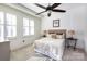 Comfortable bedroom with neutral decor and window shutters at 4620 Piedmont Row Dr # 504, Charlotte, NC 28210