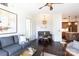 Open living area with comfortable seating and adjacent kitchen at 4620 Piedmont Row Dr # 504, Charlotte, NC 28210