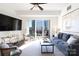 Open living area featuring hardwood floors and city views at 4620 Piedmont Row Dr # 504, Charlotte, NC 28210