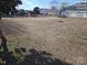 Large backyard with a mostly bare lawn at 4630 Sw Falcon Chase Sw Dr, Concord, NC 28027