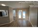 Bright dining area with French doors and hardwood floors at 4630 Sw Falcon Chase Sw Dr, Concord, NC 28027