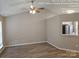 Spacious living room with neutral colors and ceiling fan at 4630 Sw Falcon Chase Sw Dr, Concord, NC 28027