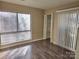 Bright bedroom with hardwood floors and closet at 4902 Spring Lake Dr # E, Charlotte, NC 28212