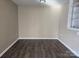 Simple dining area with hardwood floors at 4902 Spring Lake Dr # E, Charlotte, NC 28212