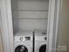 Laundry closet with washer and dryer included at 4902 Spring Lake Dr # E, Charlotte, NC 28212