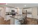 Modern kitchen with stainless steel appliances and an island at 549 Zermatt Ct, Monroe, NC 28112