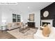 Cozy living room with fireplace and neutral color palette at 560 Zermatt St # 256, Monroe, NC 28112