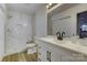 Updated bathroom with white vanity and marble shower at 6411 Windsor Gate Ln, Charlotte, NC 28215