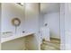 Bright bathroom with white vanity and marble shower at 6411 Windsor Gate Ln, Charlotte, NC 28215