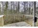 Wooden deck overlooking a wooded area at 6411 Windsor Gate Ln, Charlotte, NC 28215