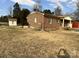 A view of the backyard of this single-story home with a shed at 740 Jackson Rd, Salisbury, NC 28146