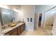 Elegant bathroom with dual vanity and walk-in shower at 8012 Plymouth Dr, Sherrills Ford, NC 28673