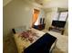 Charming bedroom with a double bed and TV at 8024 Bronze Pike Dr, Charlotte, NC 28273