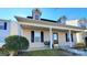 Two-story house with a covered porch and landscaping at 8024 Bronze Pike Dr, Charlotte, NC 28273