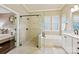 Bathroom features a large shower and soaking tub at 8130 Clems Branch Rd, Fort Mill, SC 29707