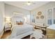 Bright bedroom with a neutral color palette and hardwood floors at 8130 Clems Branch Rd, Fort Mill, SC 29707