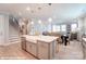 Open concept kitchen with island and farmhouse sink at 9842 Quercus Ln, Huntersville, NC 28078