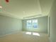 Unfinished Bonus Room featuring two windows at 9934 Cask Way, Huntersville, NC 28078