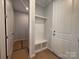 Functional mudroom with built-in bench, shelving, and storage at 9934 Cask Way, Huntersville, NC 28078