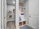 Stylish mudroom with storage bench, shelving, and a decorative rug at 9934 Cask Way, Huntersville, NC 28078