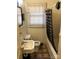 Simple bathroom with a bathtub, toilet, and sink at 1004 Druid Cir, Charlotte, NC 28206