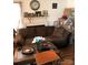 Cozy living room featuring a brown sofa and wood coffee table at 1004 Druid Cir, Charlotte, NC 28206