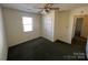 Spacious bedroom with double-door closet and ceiling fan at 1004 Johnson St, Charlotte, NC 28206