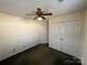 Bedroom with double-door closet and ceiling fan at 1004 Johnson St, Charlotte, NC 28206