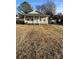 Charming single-story home with a cozy front porch and ample yard space at 1004 Johnson St, Charlotte, NC 28206