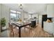 Modern kitchen and dining area with a large island and an abundance of natural light at 10433 Pullengreen Dr, Charlotte, NC 28277