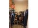 Organized closet space with shelving for shoes and ample hanging storage for clothes at 11306 Kingfisher Dr, Charlotte, NC 28226