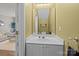 Clean bathroom with white vanity, toilet and mirror at 12250 Savannah Garden Dr, Charlotte, NC 28273