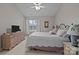 Spacious bedroom with a dresser and a king-size bed at 12250 Savannah Garden Dr, Charlotte, NC 28273