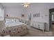 Bedroom with a full bed and built-in dresser at 12250 Savannah Garden Dr, Charlotte, NC 28273