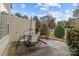 Cozy patio with table and chairs, perfect for relaxing at 12250 Savannah Garden Dr, Charlotte, NC 28273