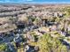 Expansive aerial view of the residential community, highlighting the lush tree cover and well-spaced homes at 12527 Cedar Post Ln, Charlotte, NC 28215