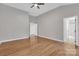 Empty bedroom with hardwood floors and natural light at 12527 Cedar Post Ln, Charlotte, NC 28215