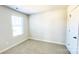 Bright bedroom with carpeted floors and large window at 1260 31St Ne St, Hickory, NC 28613