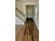 Bright entryway with wood-look floors, staircase, and access to the main living area at 1260 31St Ne St, Hickory, NC 28613