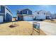 Two-story house with gray siding, brick accents, and a two-car garage at 1260 31St Ne St, Hickory, NC 28613