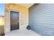 Side entrance with brick and gray siding at 1260 31St Ne St, Hickory, NC 28613