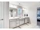 Bright bathroom with double vanity sinks, and neutral color scheme at 1328 Lena St, Monroe, NC 28112