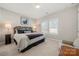 Bedroom with floral headboard and window shutters at 13308 Oak Farm Ln, Huntersville, NC 28078